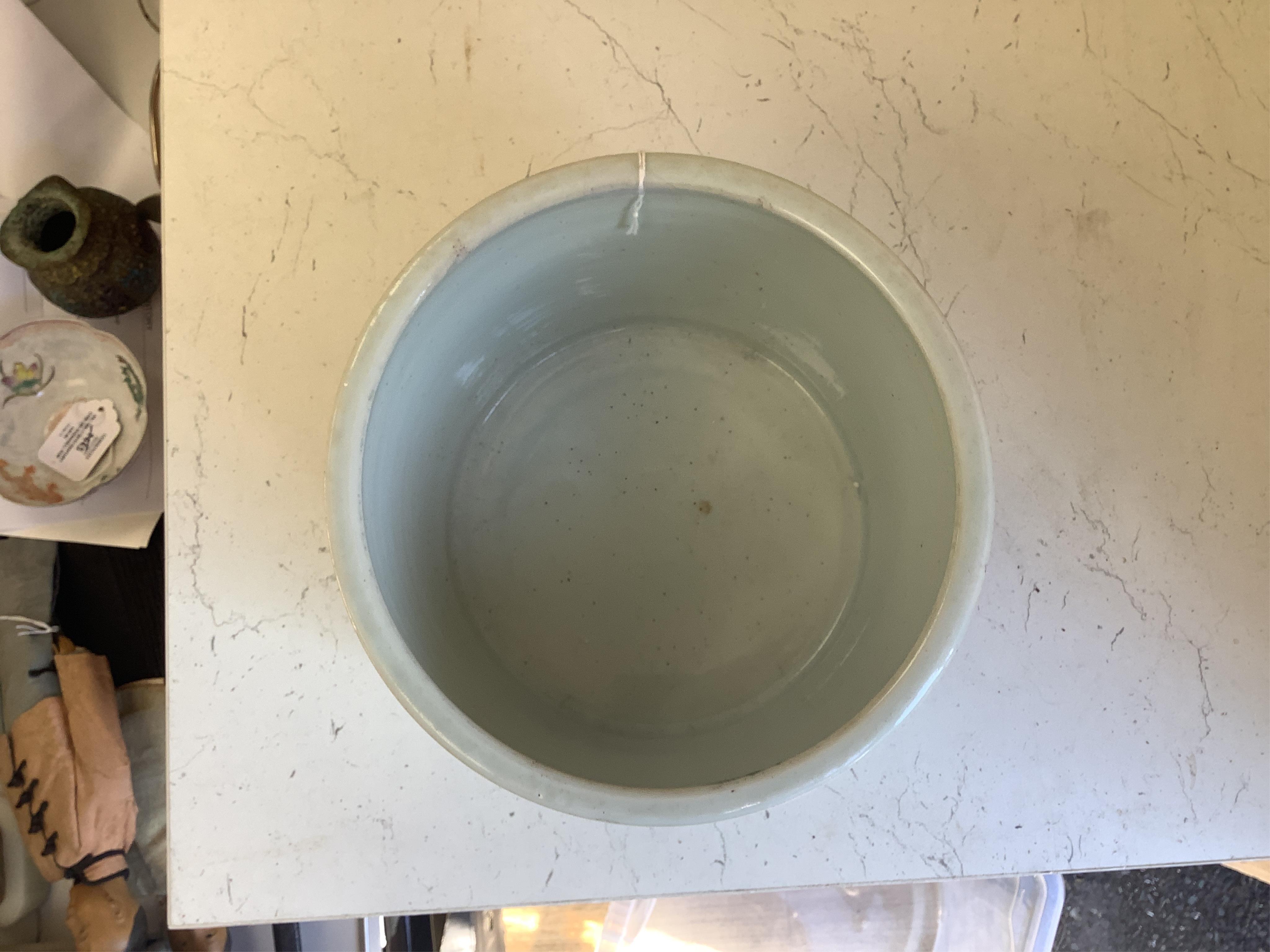 A Chinese blue and white brushpot, 17cm high. Condition - good